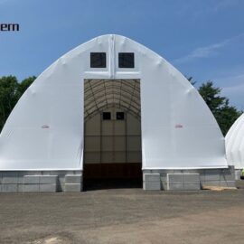 Abri de stockage à arc à treillis simple